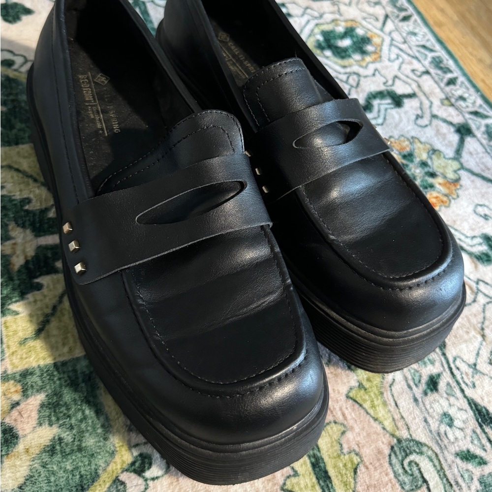 Black loafers